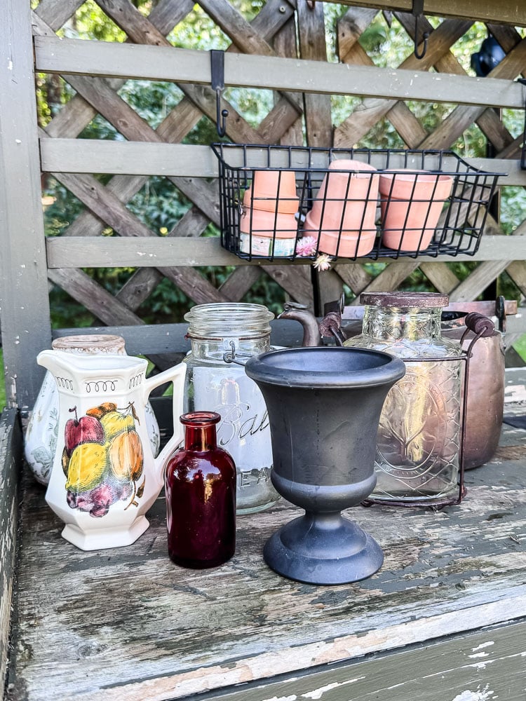 a variety of vases and vessels for flowers