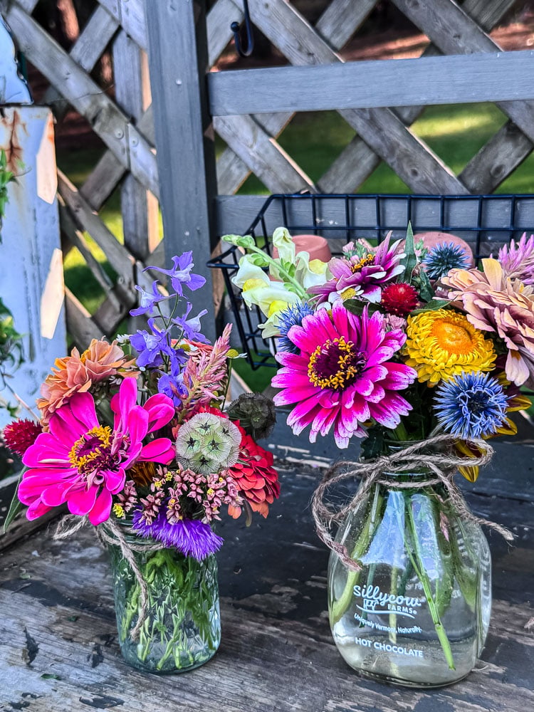 fresh flowers in small glass jars
