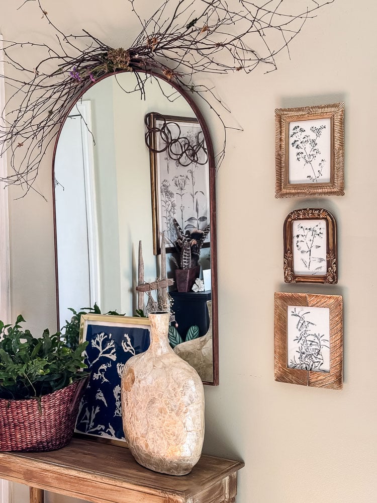 entryway table with arched mirror