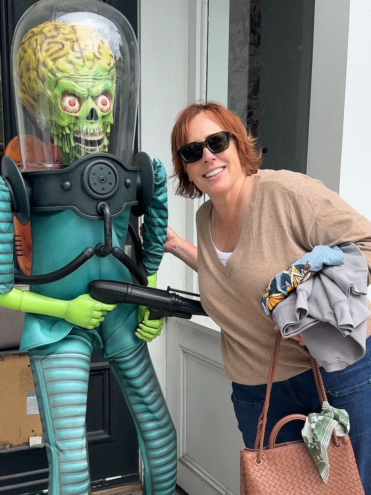 ufo statue and woman