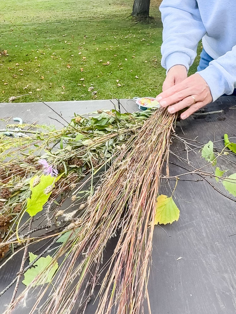 making a fall door swag outside
